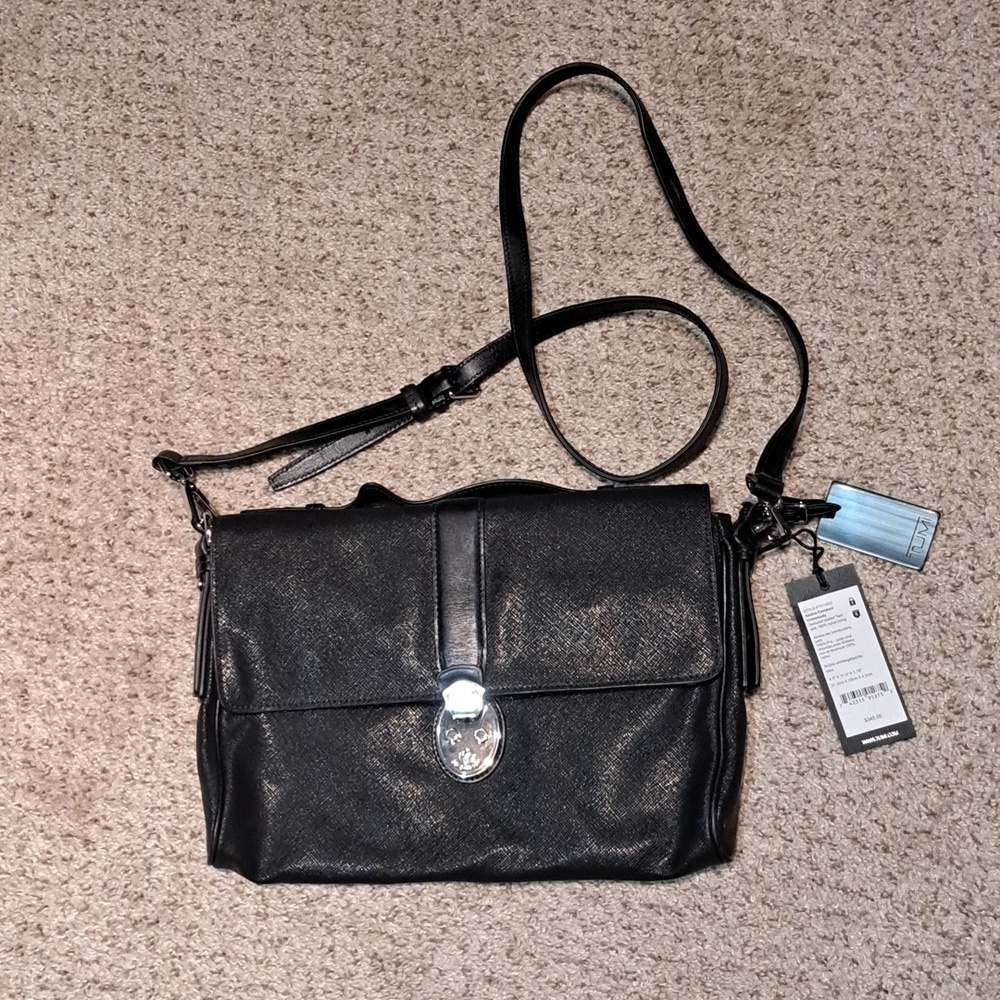 NWT TUMI Andria Compact Crossbody with security lock, $345.00